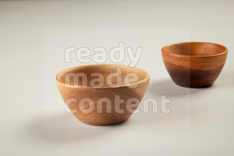 Wooden bowl on white background