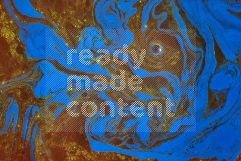 The image depicts a marbling effect with swirling patterns of red, blue and yellow