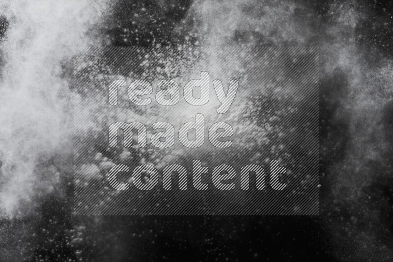White powder explosion on black background