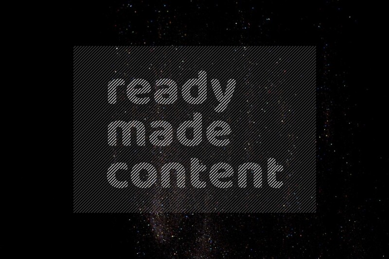 Multicolored glitter powder isolated on black background