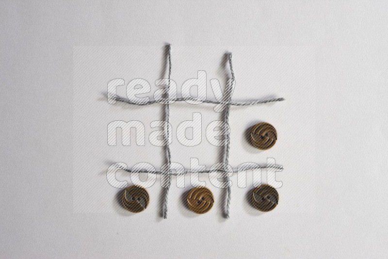 Metal buttons on grey background