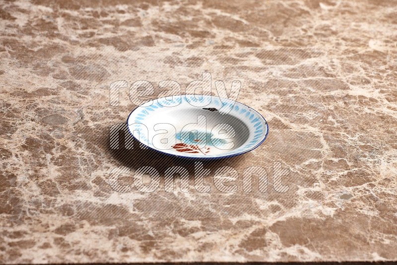 Vintage Metal Plate on Beige Marble Flooring, 45 degrees