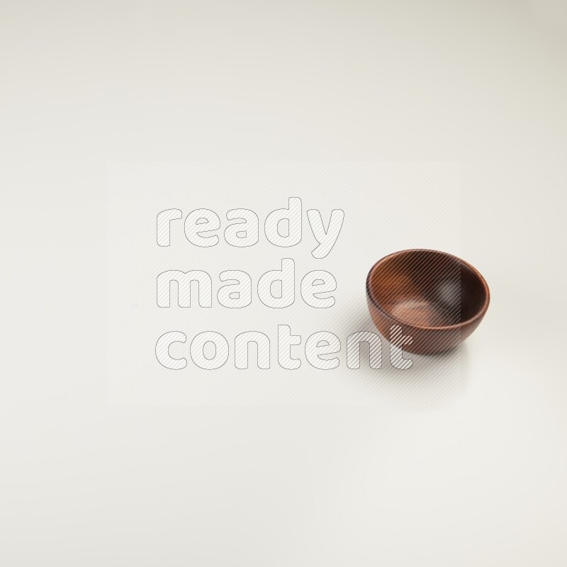 Wooden bowl on white background