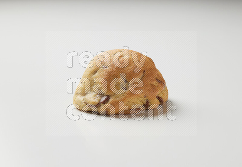 a chocolate chip cookie on a white background