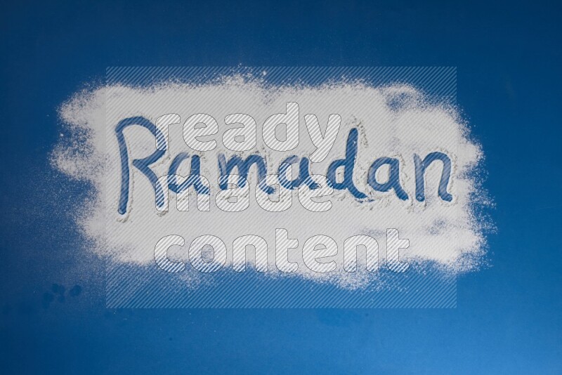A word written with powder on blue background