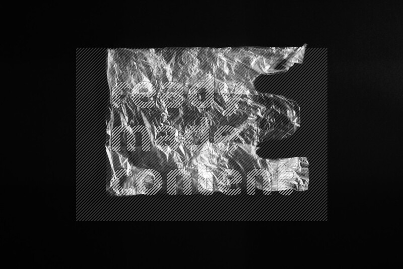 Transparent plastic textures on black background