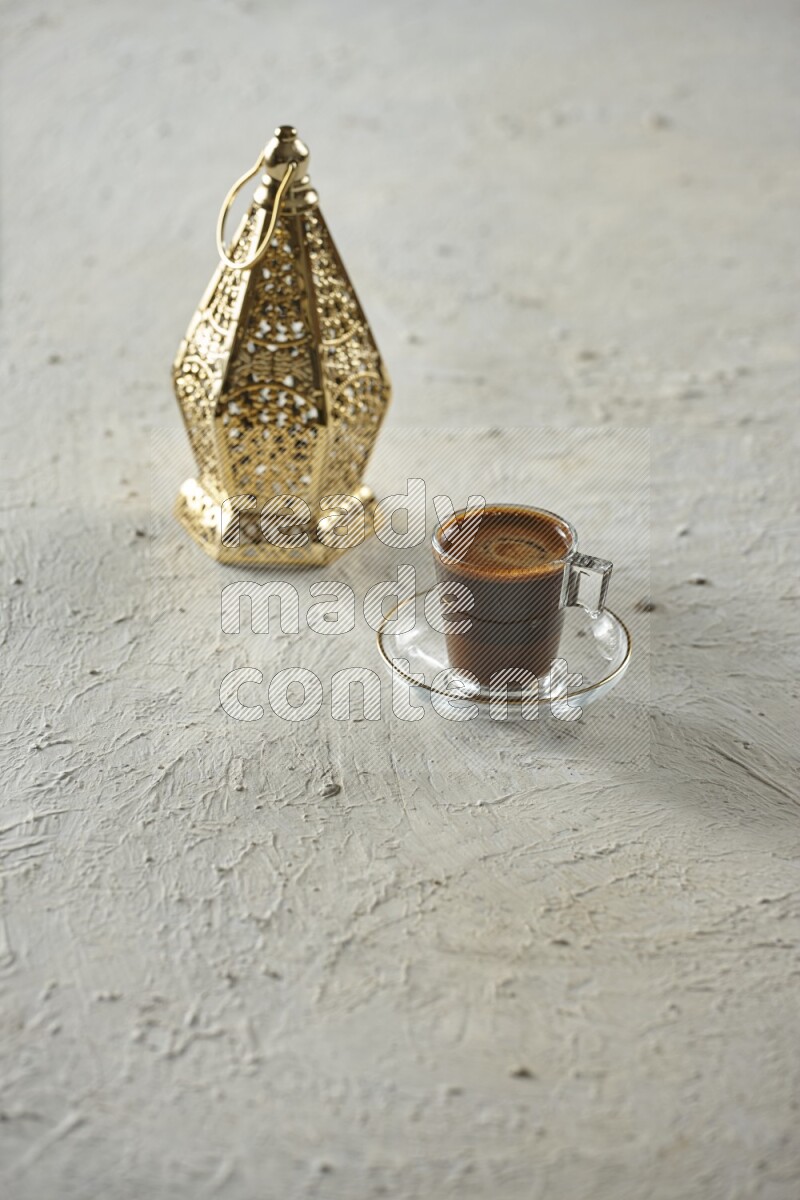A golden lantern with different drinks, dates, nuts, prayer beads and quran on textured white background