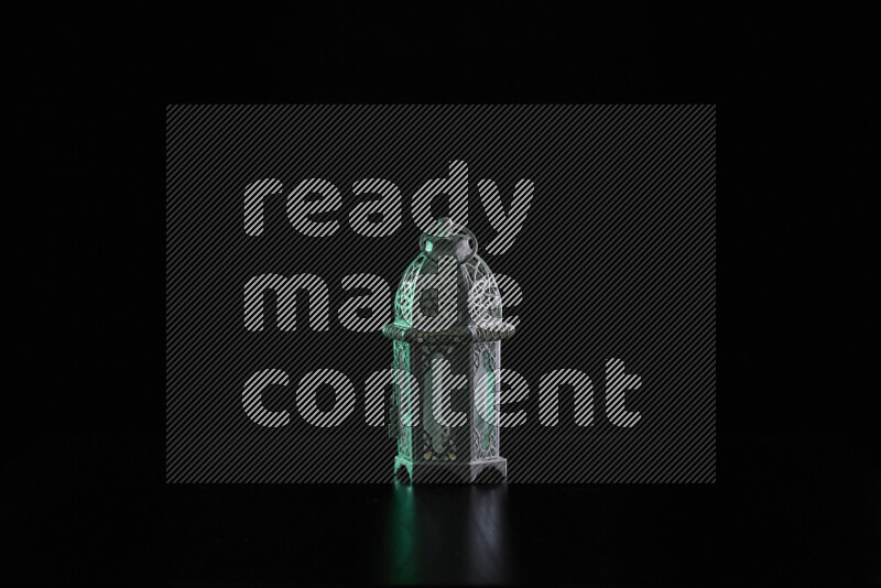 Ramadan lanterns with colored rim light against black background