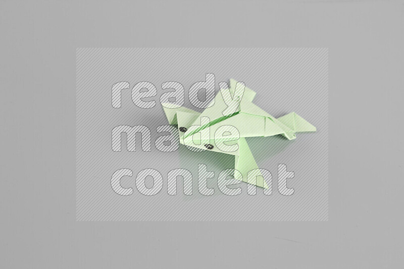 Origami animals on grey background