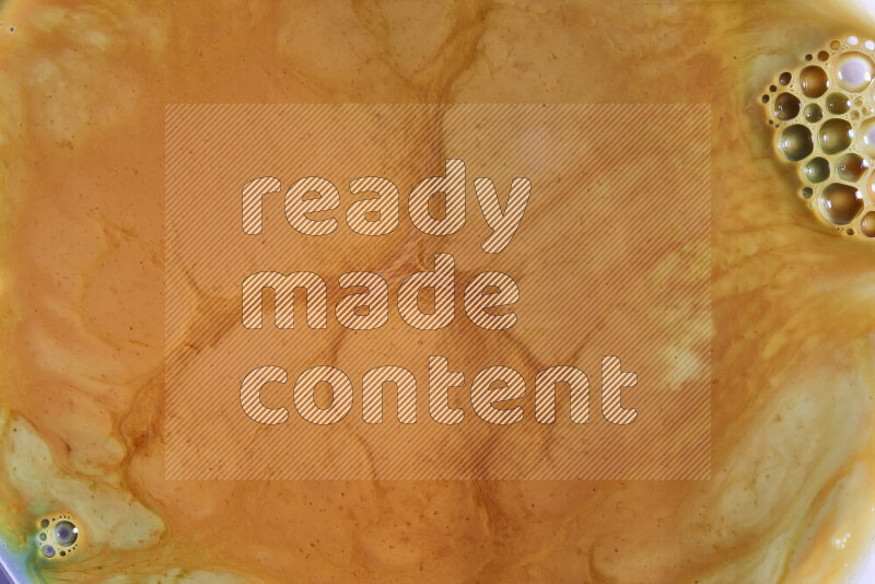 لقطة مقربة لأنماط دوامية باللون البرتقالي