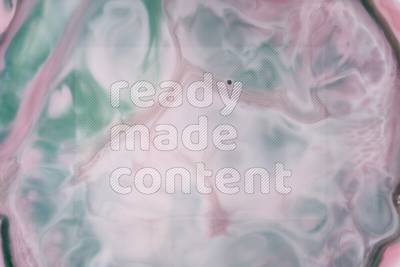 صورة مقربة لأنماط دوامية مجردة باللون الأحمر والأخضر