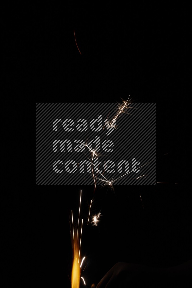 Sparkler candle isolated on black background