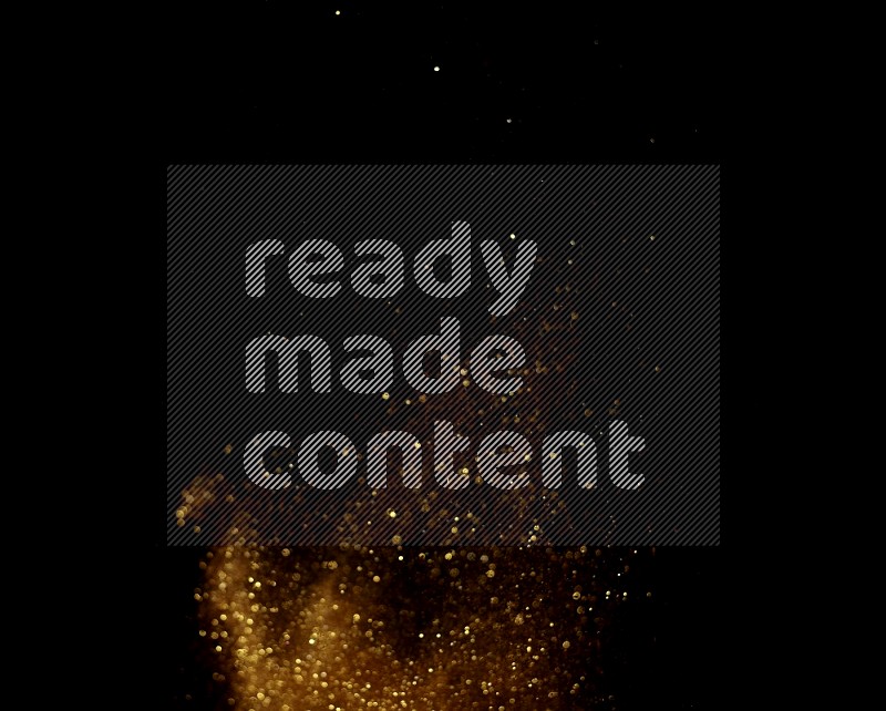Gold glitter powder isolated on black background