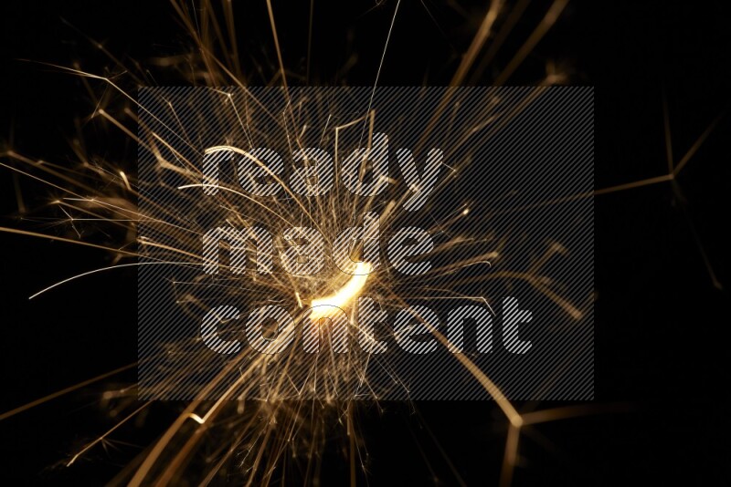 Sparkler candle isolated on black background