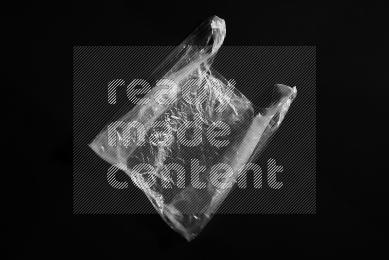 Transparent plastic textures on black background