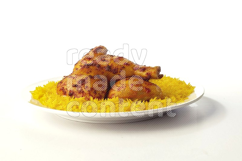 yellow basmati Rice with kabsa chicken pieces on a white rounded plate direct on white background