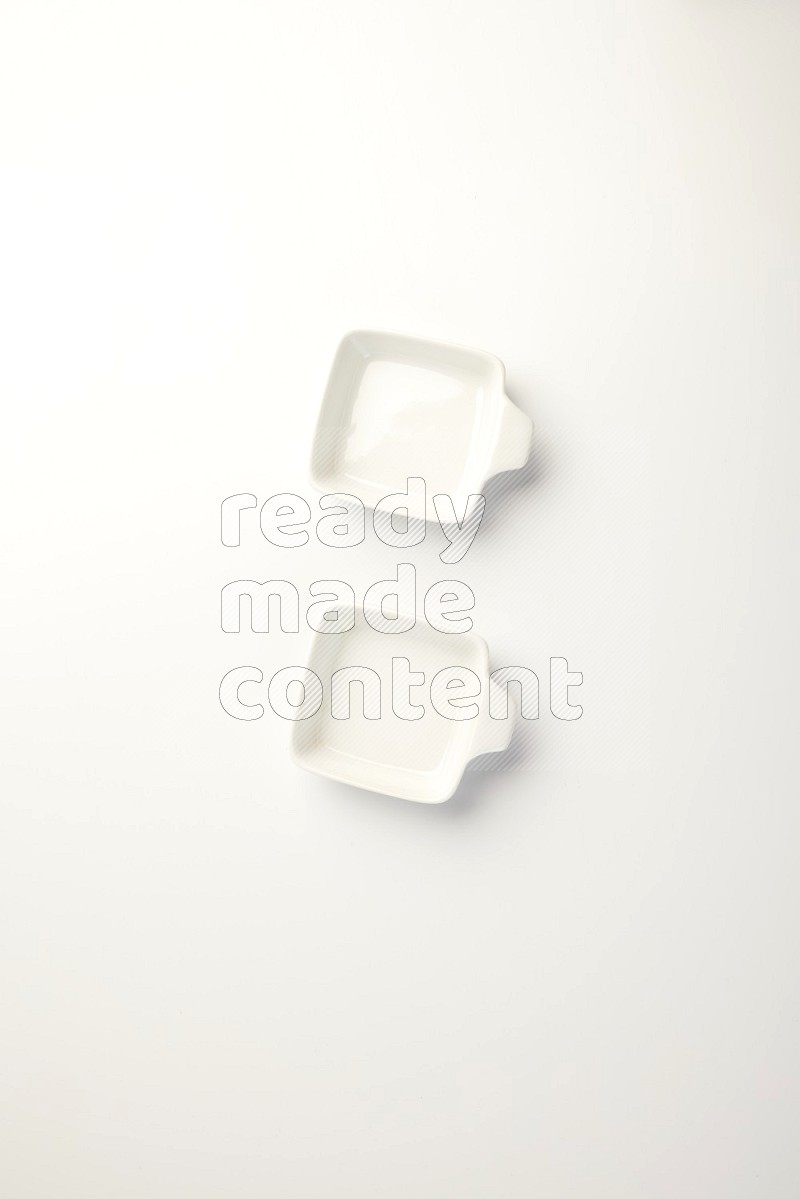 white ceramic square sauce dish on white countertop