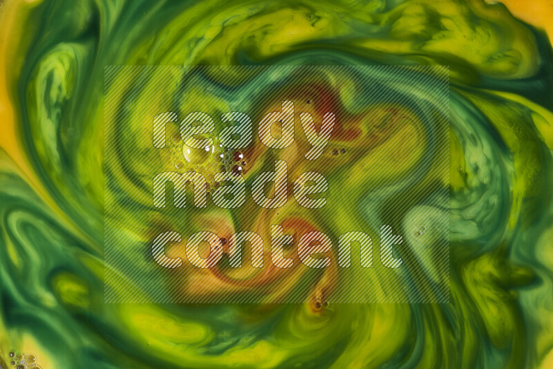 A close-up of abstract swirling patterns in orange, green and red