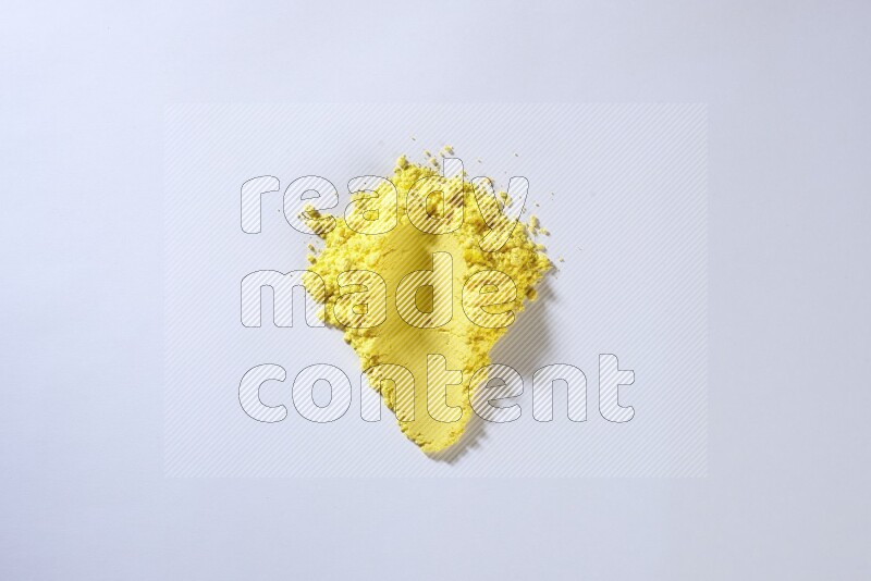Yellow powder strokes on white background