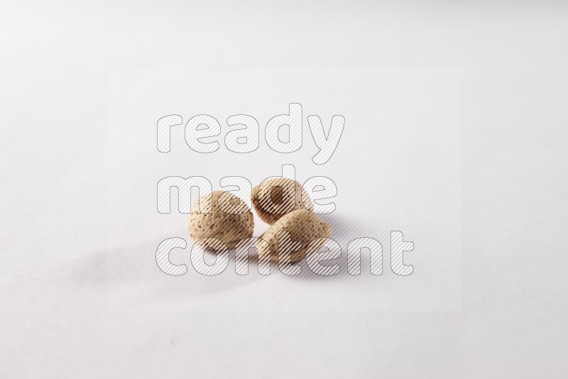 Almonds on white background