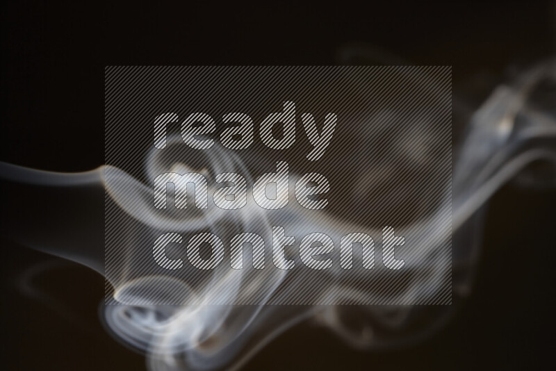 Motion of wavy smoke isolated on dark background