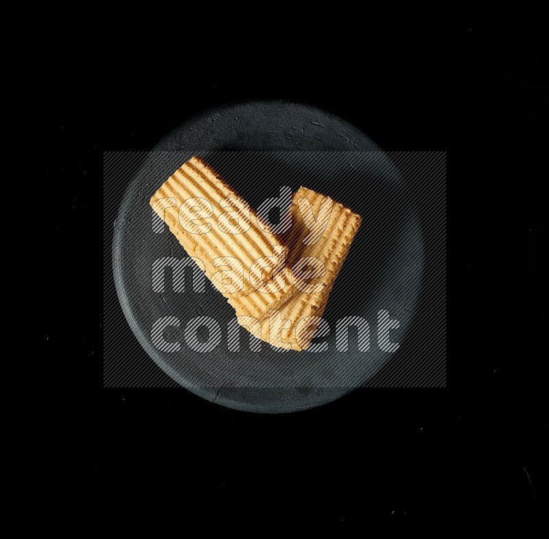 Top View of Plain Tea Biscuits Cookies on Black Flooring