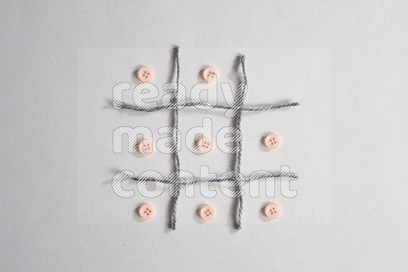 Rose buttons on grey background