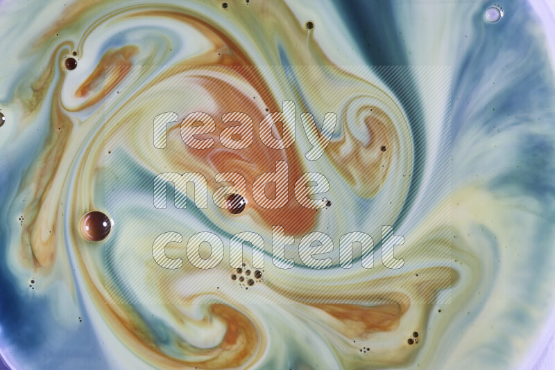 A close-up of abstract swirling patterns in green, blue and red