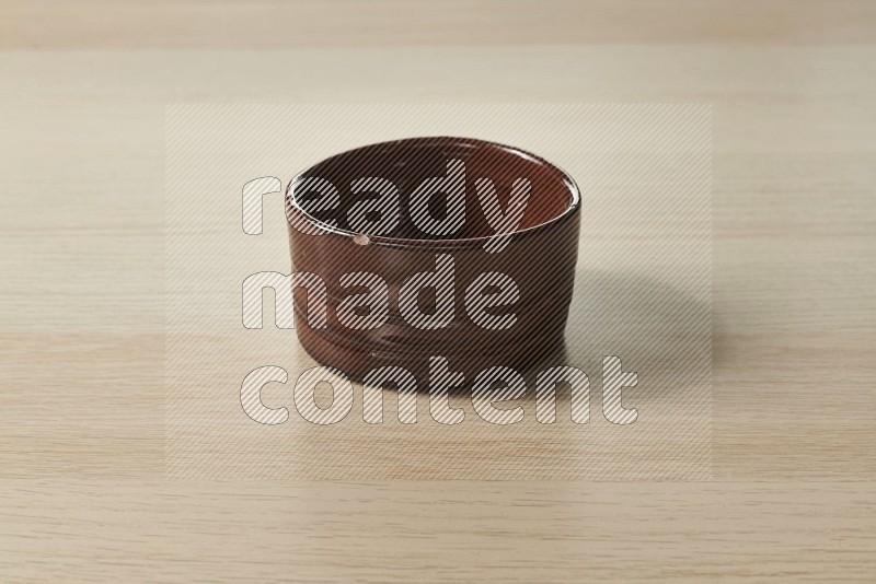 Brown Pottery Bowl on Oak Wooden Flooring, 15 degrees