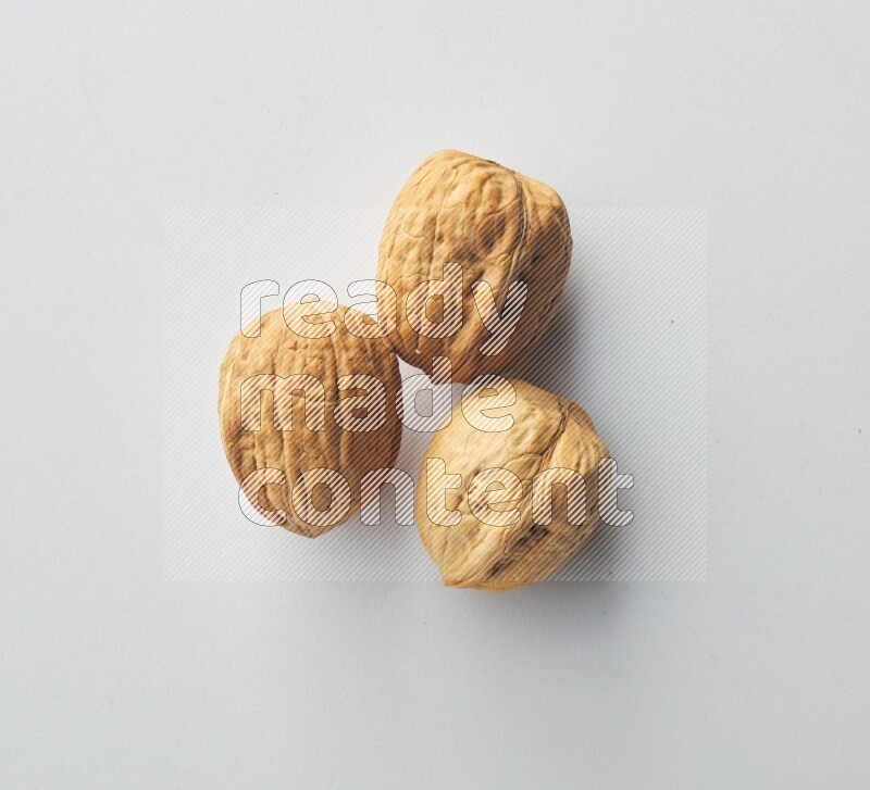 Top-view shot of walnut on white background