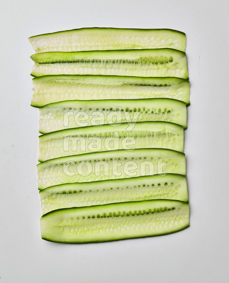 cucumber ribbons on a white background