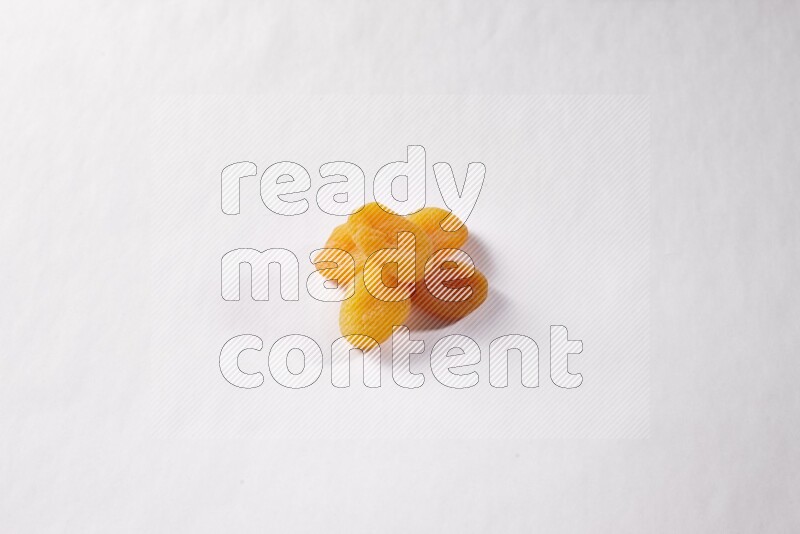 Dried apricots on white background