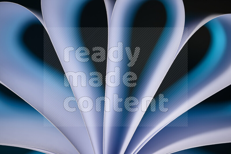 An abstract art piece displaying smooth curves in white and blue gradients created by colored light