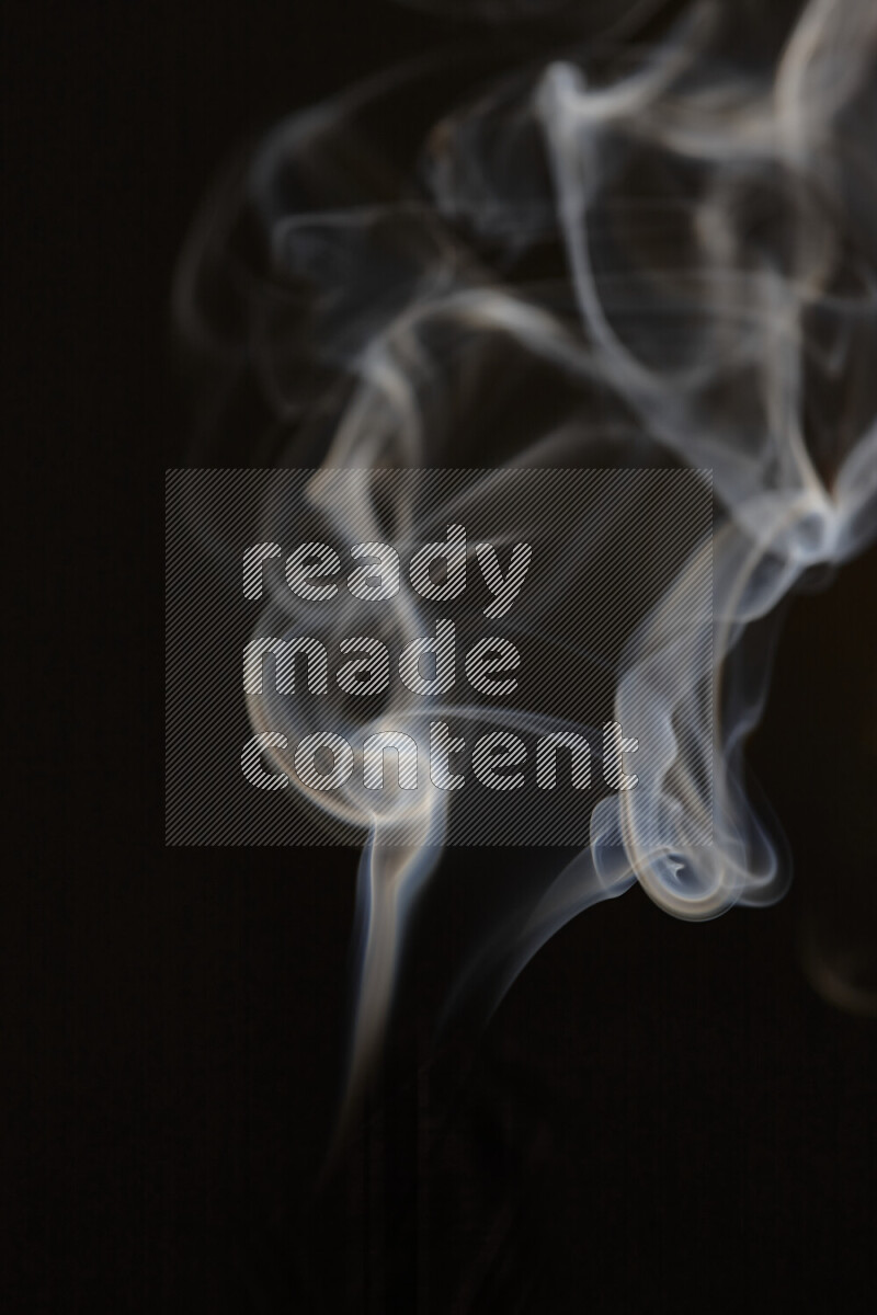 Motion of wavy smoke isolated on dark background