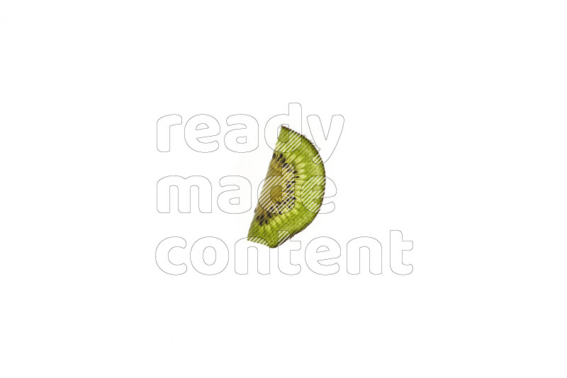 Kiwi slices on illuminated white background