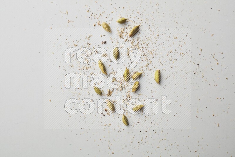 Top-view shot of Cardamon on white background
