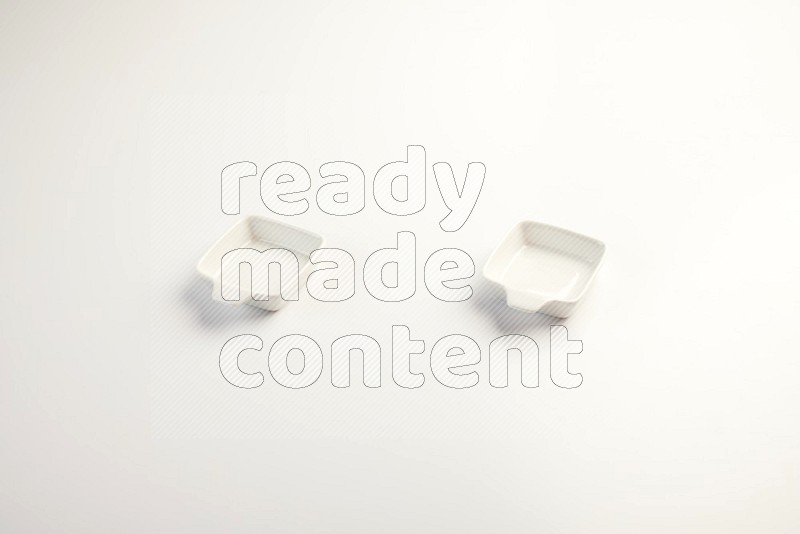 white ceramic square sauce dish on white countertop