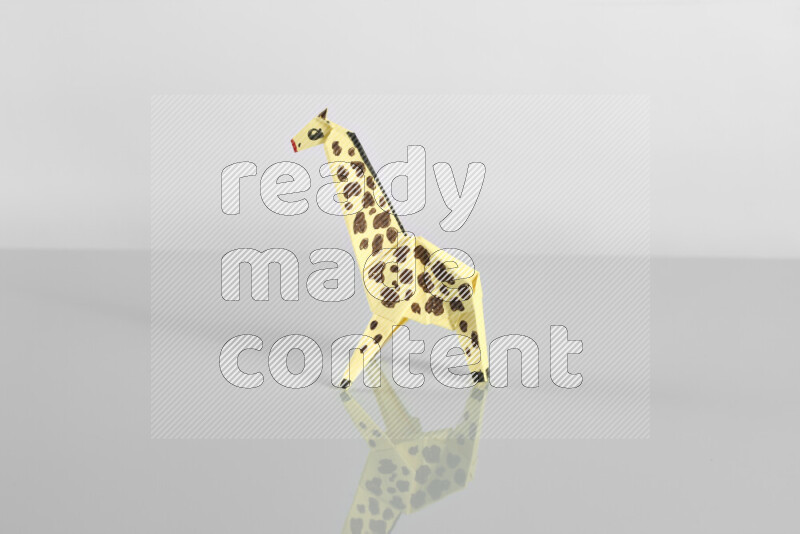 Origami animals on grey background