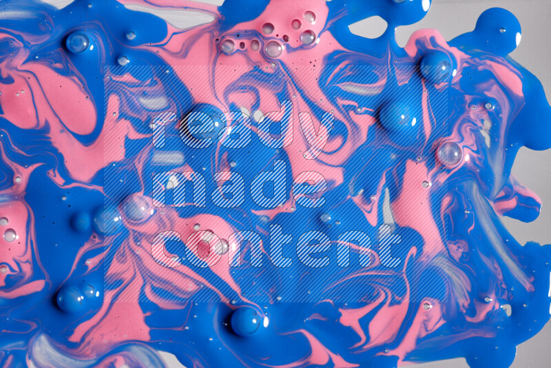 Abstract colorful background with mixed of pink and blue paint colors