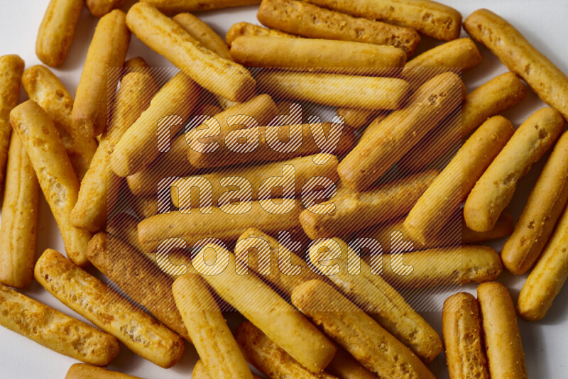 Assorted snacks on white background