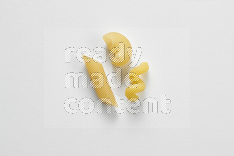 Different pasta types on white background
