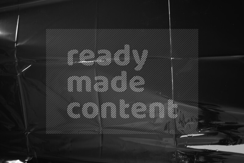 Plastic wrap texture on black background