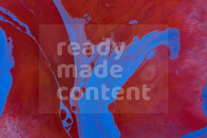 The image depicts a marbling effect with swirling patterns of red and blue