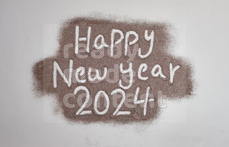 A sentence written with glitter on grey background