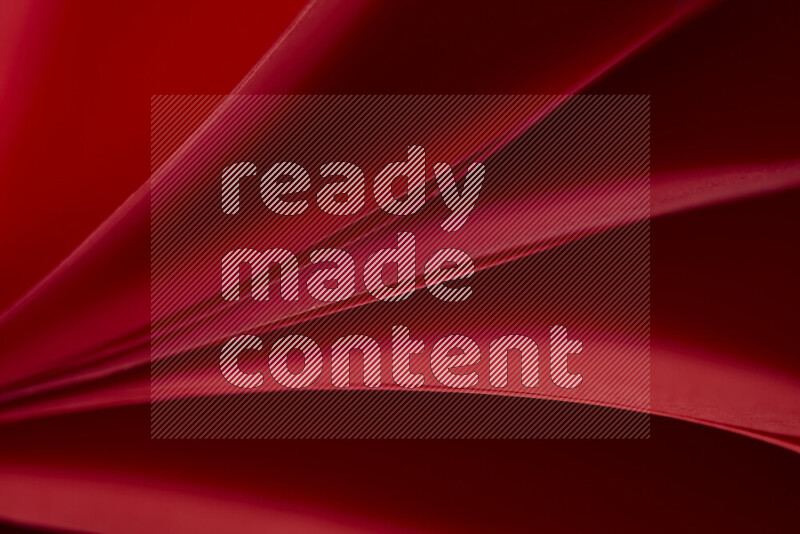 فن تجريدي يعرض المنحنيات المرتبة للأوراق باللون الأحمر