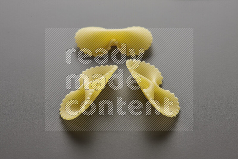 Fiocchi pasta on grey background