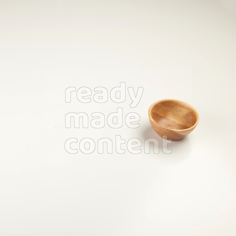 Wooden bowl on white background