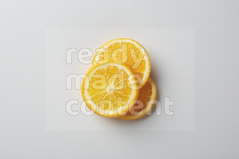 Three orange slices on a white background