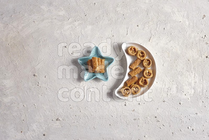 Oriental sweets in a pottery plate in a light setup