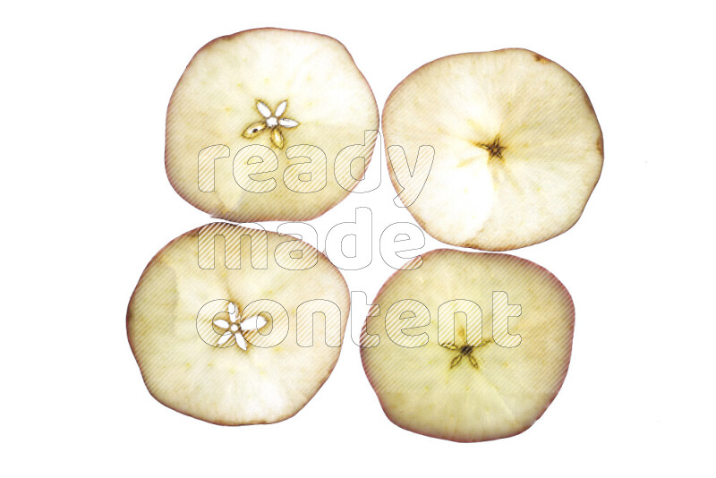 Apple slices on illuminated white background